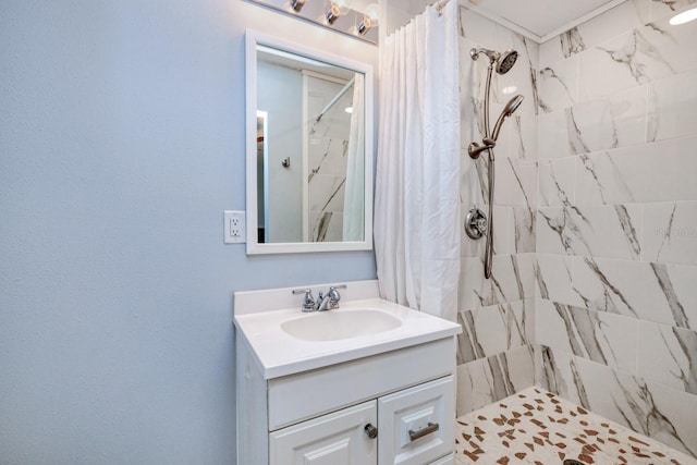 bathroom with a shower with curtain and vanity