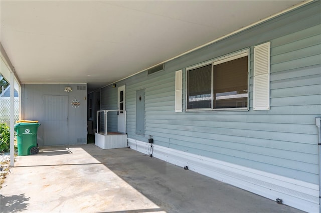 view of patio with an attached carport