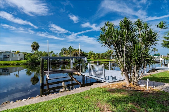 view of dock featuring a water view and boat lift