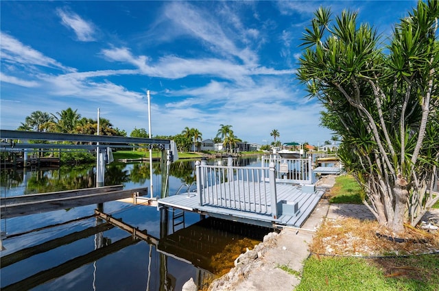 view of dock featuring a water view and boat lift