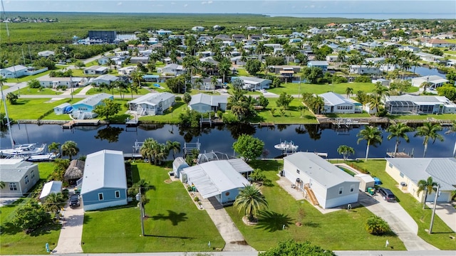 drone / aerial view with a water view