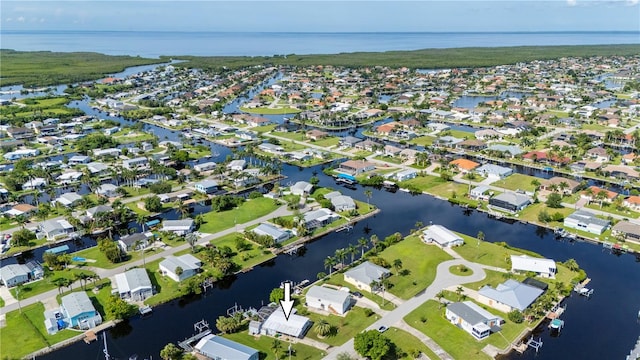 drone / aerial view featuring a water view