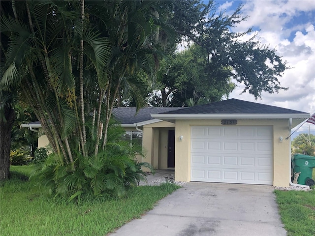 single story home featuring a garage