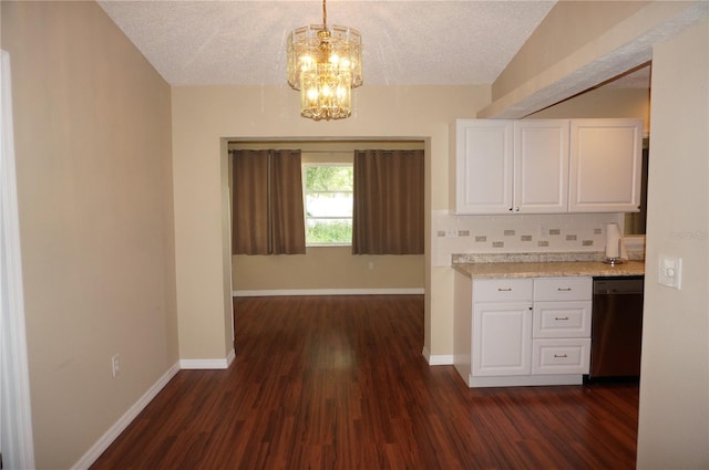 kitchen featuring dark hardwood / wood-style flooring, dishwasher, white cabinetry, and backsplash