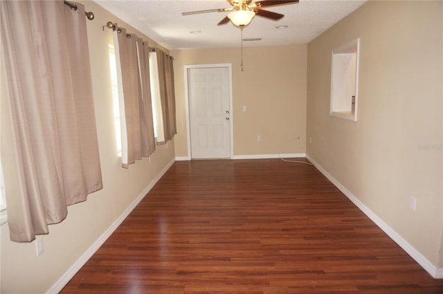 unfurnished room with a textured ceiling, ceiling fan, and hardwood / wood-style floors