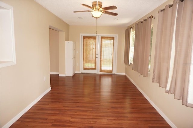 spare room featuring ceiling fan and hardwood / wood-style floors