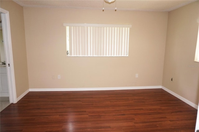 empty room featuring hardwood / wood-style floors