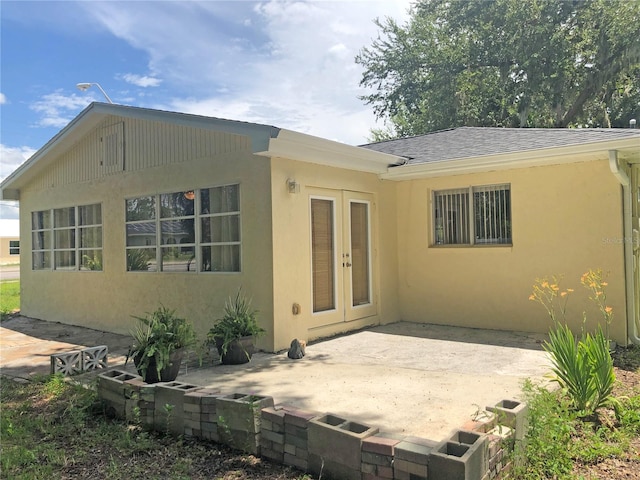 rear view of house featuring a patio