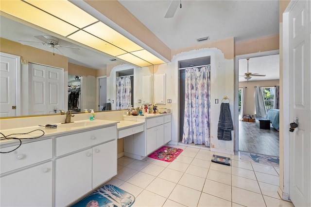 bathroom with vanity, tile patterned flooring, and ceiling fan