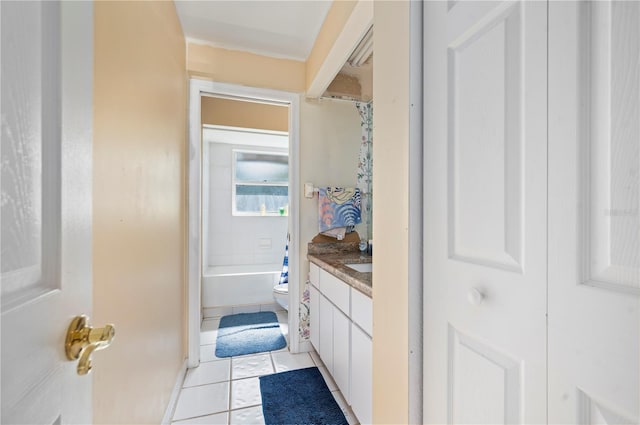 full bathroom with vanity, shower / bath combo, toilet, and tile patterned flooring