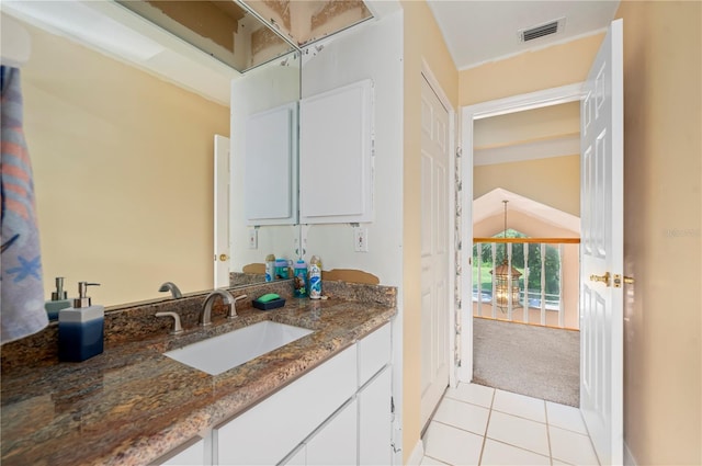 bathroom with vanity and tile patterned flooring