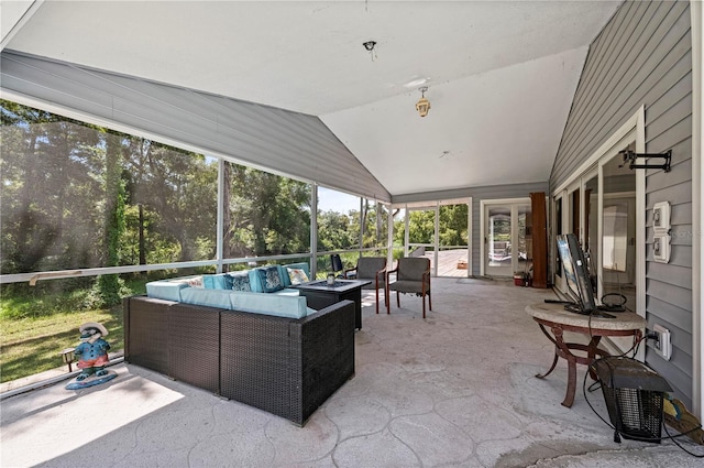 sunroom with lofted ceiling