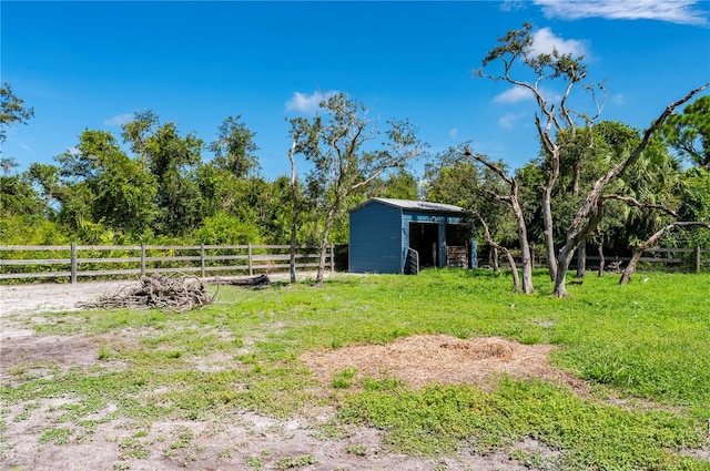 view of yard with a storage unit