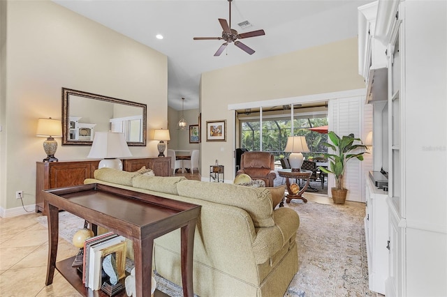 living room featuring light tile patterned flooring and ceiling fan