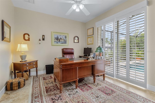 3327 Surfside Blvd, Cape Coral, FL 33914 - tiled office space with a ceiling fan and baseboards