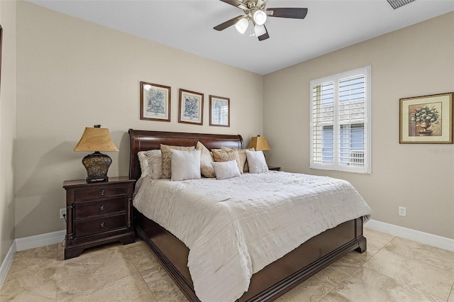 tiled bedroom featuring ceiling fan