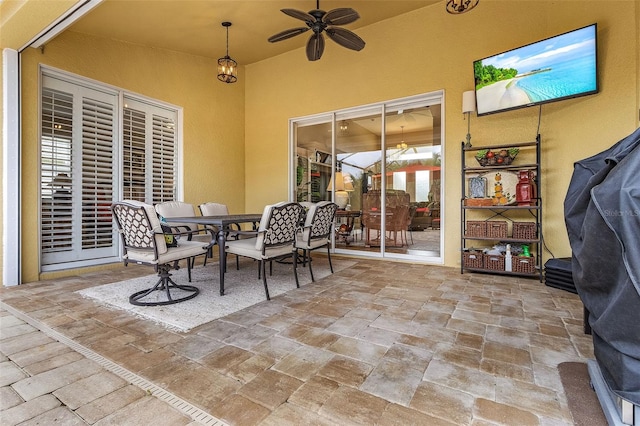 3327 Surfside Blvd, Cape Coral, FL 33914 - view of patio / terrace with outdoor dining area and ceiling fan