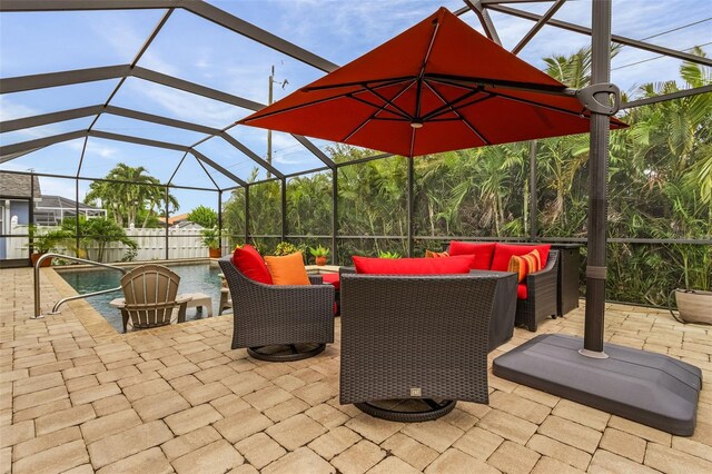 view of patio with an outdoor hangout area and a lanai