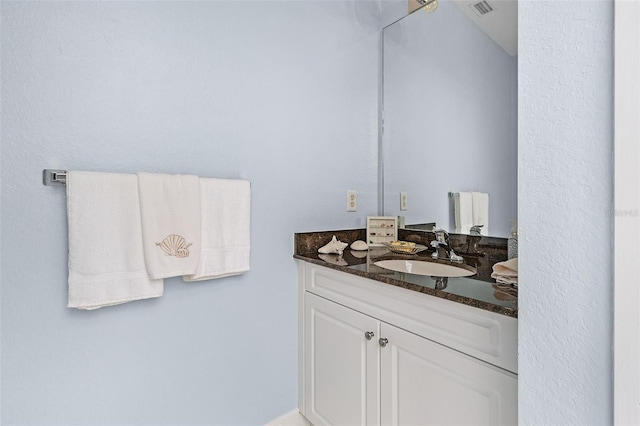 3327 Surfside Blvd, Cape Coral, FL 33914 - bathroom featuring visible vents and vanity