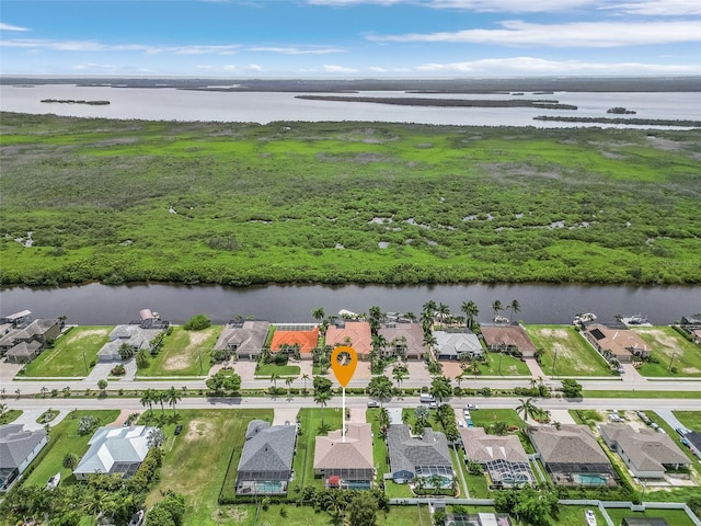 3327 Surfside Blvd, Cape Coral, FL 33914 - drone / aerial view with a residential view and a water view