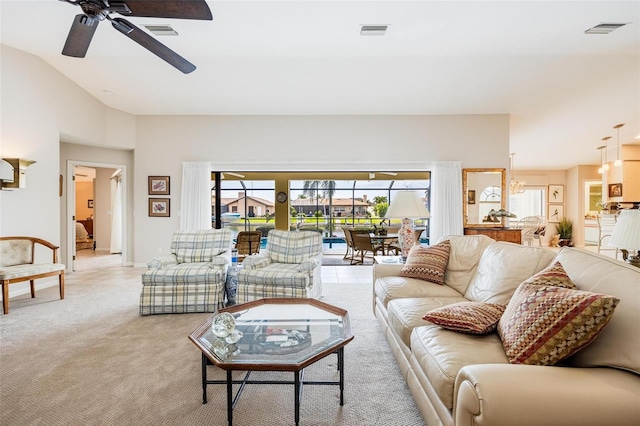 carpeted living room featuring ceiling fan