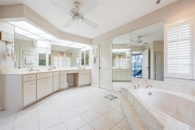 bathroom with ceiling fan, plus walk in shower, vanity, and tile patterned flooring