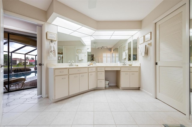 bathroom featuring tile patterned floors and vanity