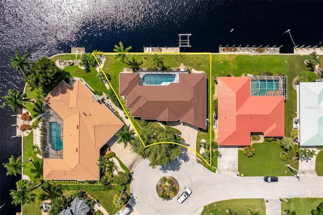 bird's eye view with a water view