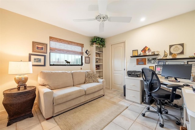 tiled office featuring ceiling fan