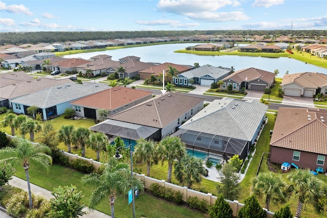 drone / aerial view with a water view