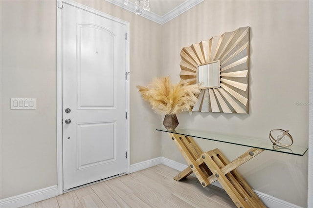 entryway featuring crown molding