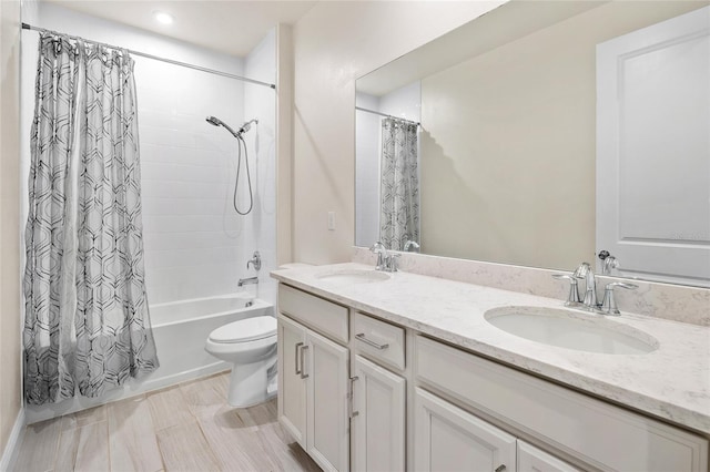 full bathroom with toilet, dual bowl vanity, and shower / bath combination with curtain