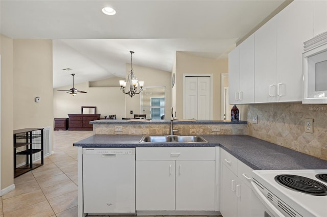 kitchen with light tile patterned flooring, ceiling fan with notable chandelier, white cabinets, dishwasher, and lofted ceiling