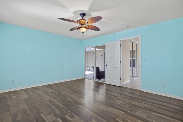 unfurnished bedroom featuring dark hardwood / wood-style flooring and ceiling fan