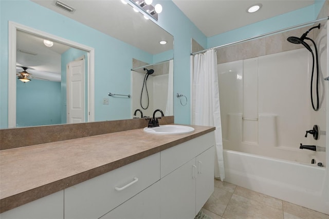 bathroom featuring shower / tub combo, tile patterned floors, vanity, and ceiling fan