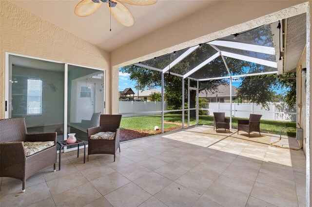 sunroom / solarium with ceiling fan