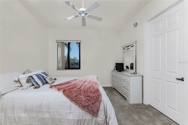 carpeted bedroom featuring ceiling fan