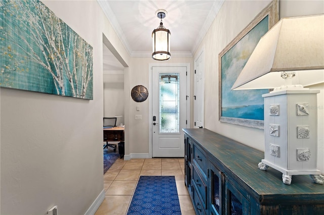 foyer entrance with crown molding and light tile patterned floors