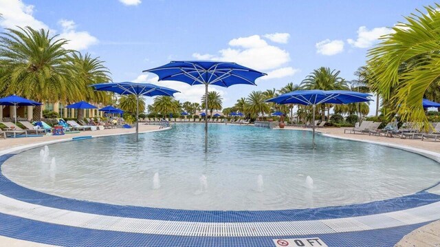 view of pool featuring pool water feature