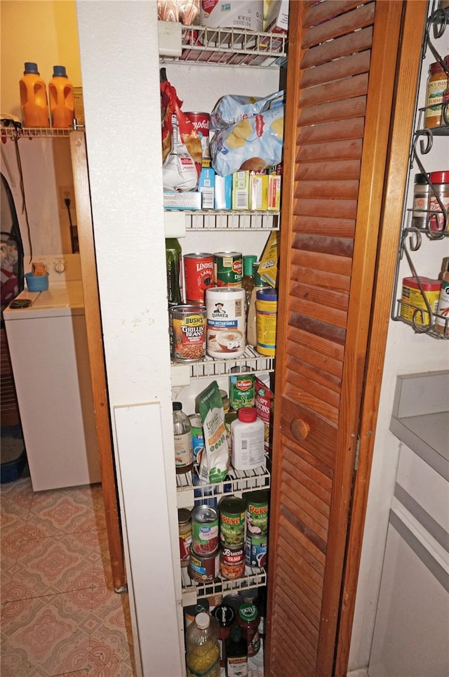 pantry featuring washer / clothes dryer