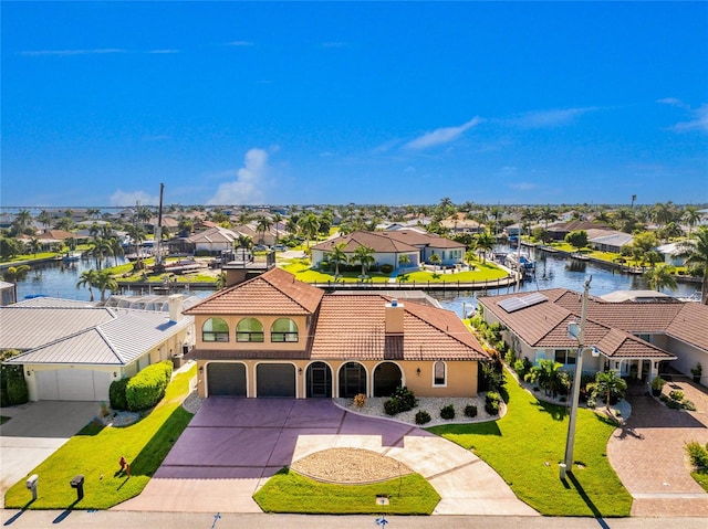 aerial view featuring a water view