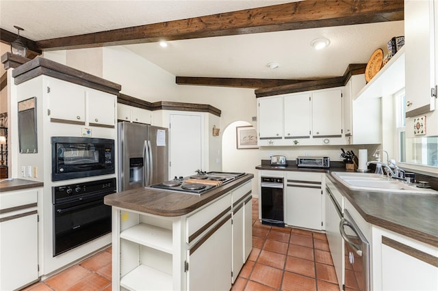 kitchen featuring white cabinetry, a textured ceiling, black appliances, sink, and lofted ceiling with beams