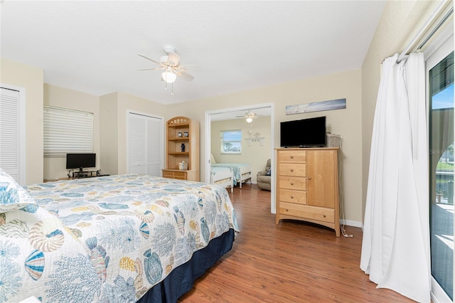 bedroom featuring hardwood / wood-style floors and ceiling fan