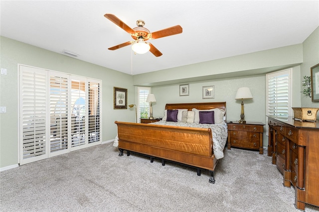 bedroom with ceiling fan and carpet