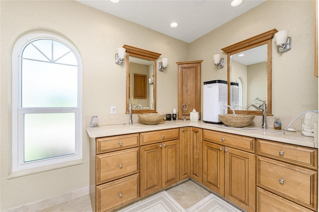 bathroom with vanity and tile patterned floors