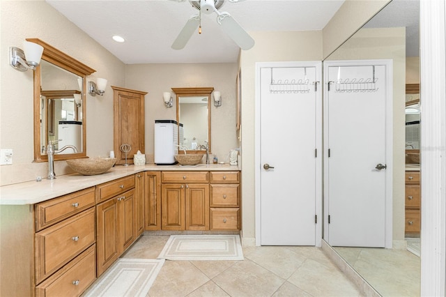 bathroom with vanity, ceiling fan, and tile patterned floors