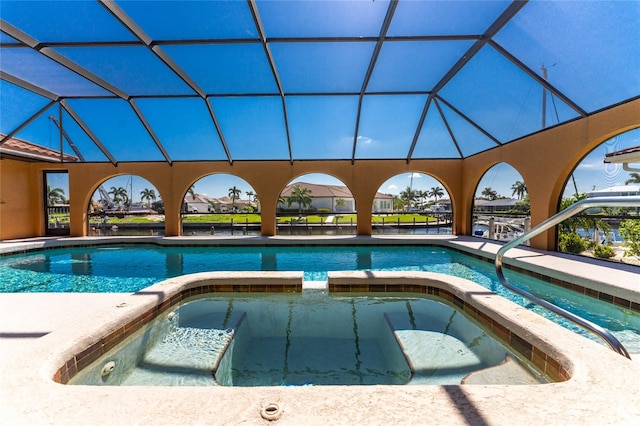 view of pool featuring a lanai