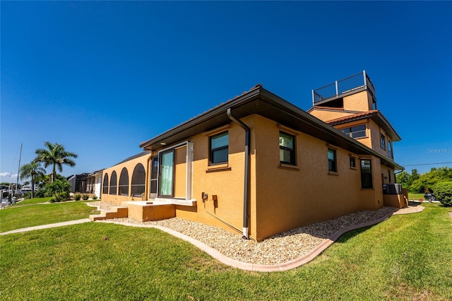 view of property exterior featuring a yard