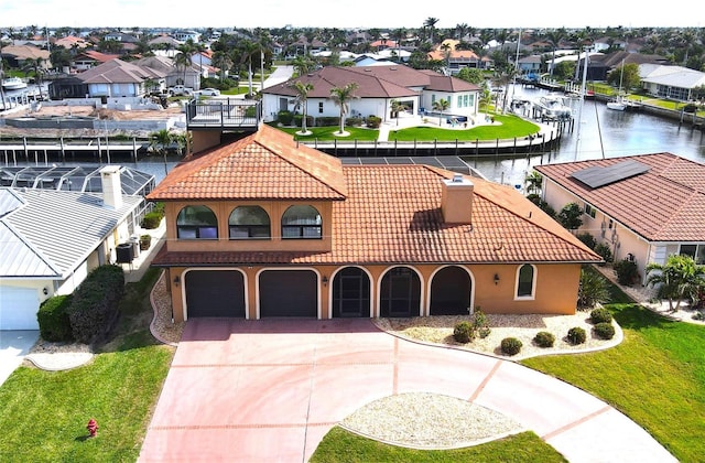 birds eye view of property featuring a water view