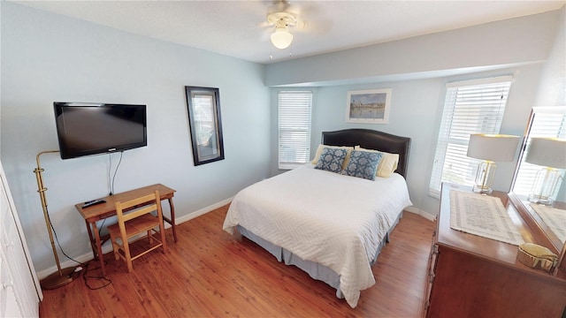 bedroom featuring ceiling fan and hardwood / wood-style floors